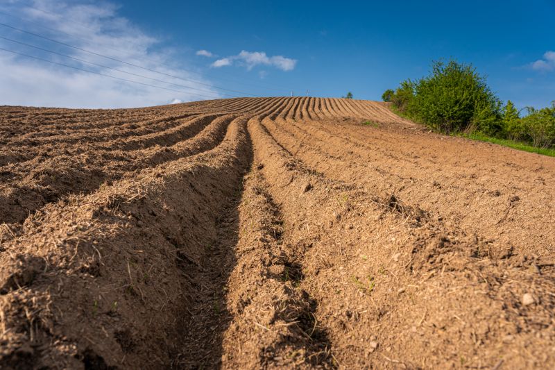 Soil redistribution during resloping